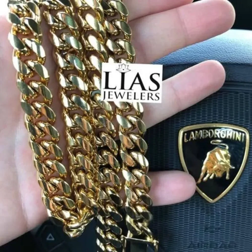New 18k yellow gold Cuban link chain and bracelet set